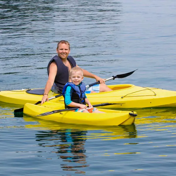 Dad and son kayaking